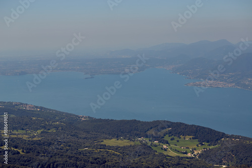 Lago di Garda lake from mountain Monte Baldo in Italy. Beautiful summer landscape. Travel in Europe. photo