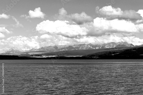 Orava reservoir with mountains in the background photo