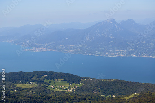 Lago di Garda lake from mountain Monte Baldo in Italy. Beautiful summer landscape. Travel in Europe. photo