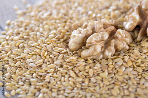 Flaxseed and walnut close up.