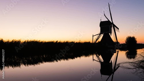 Time lapse of sunrise and mill in The Netherlands. photo