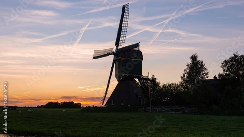 Time lapse of sunset at Kockengen with Mill in the Netherlands photo