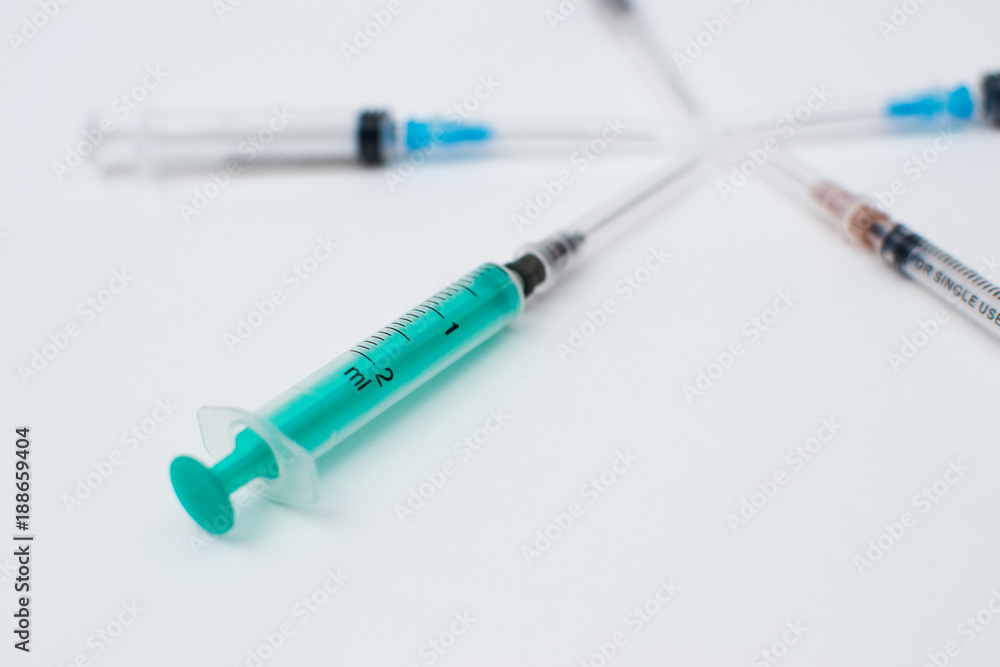 Syringes on white different sizes Syringes on white different sizes