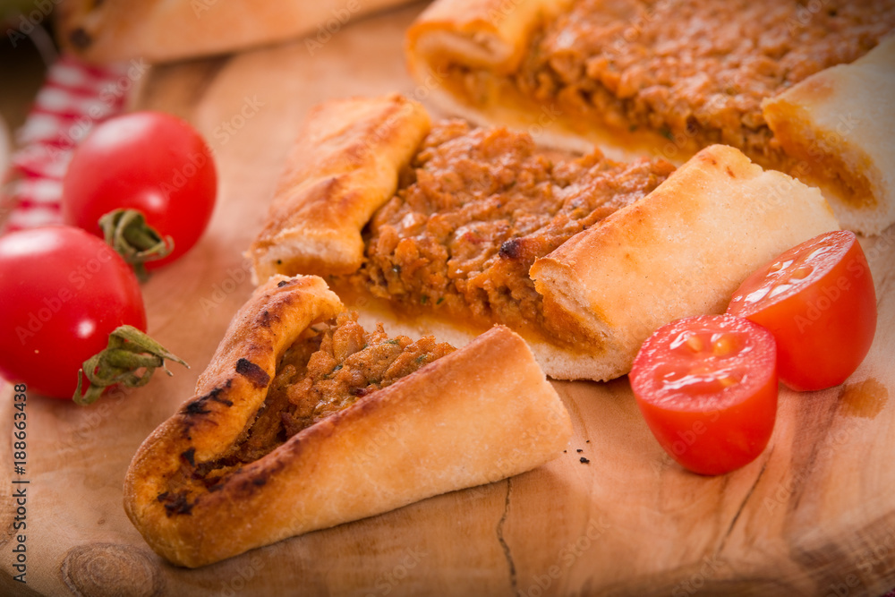 Turkish pide pizza with meat and onion. Turkish pide pizza with meat and onion.