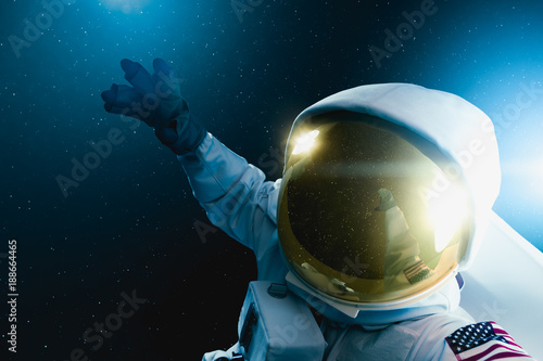 Fototapeta Naklejka Na Ścianę i Meble -  Astronaut floating in outer space , high contrast image
