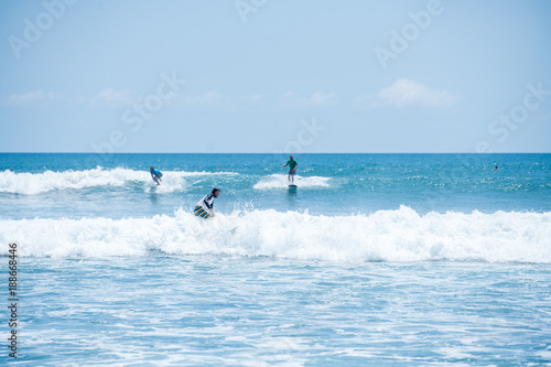 Surfing the waves of Indonesia beach
