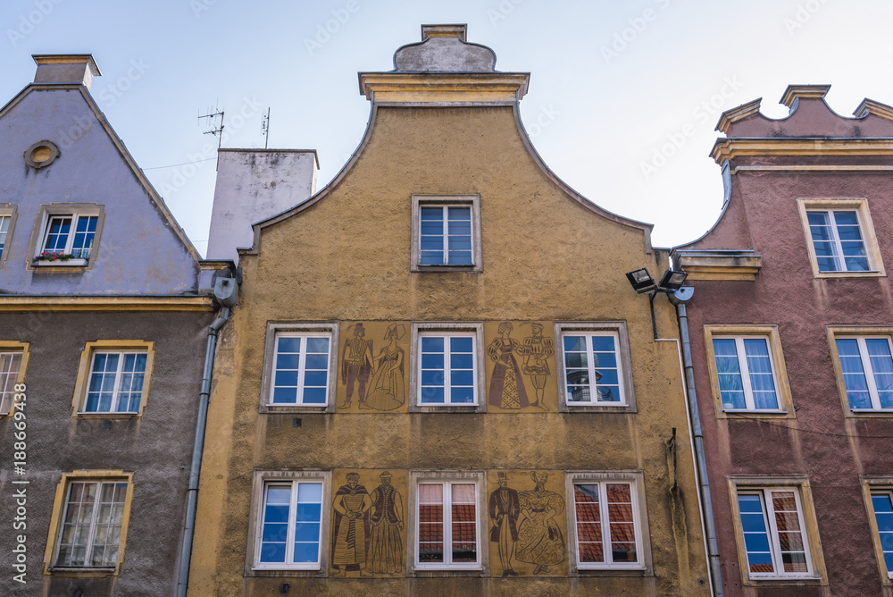 Obraz premium Row of townhouses on the market square in old part of Olsztyn, Masuria region of Poland