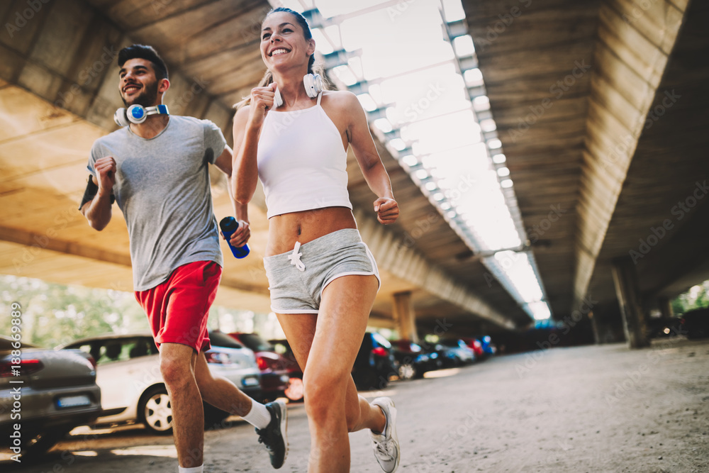 Attractive man and beautiful woman jogging together Attractive man and beautiful woman jogging together