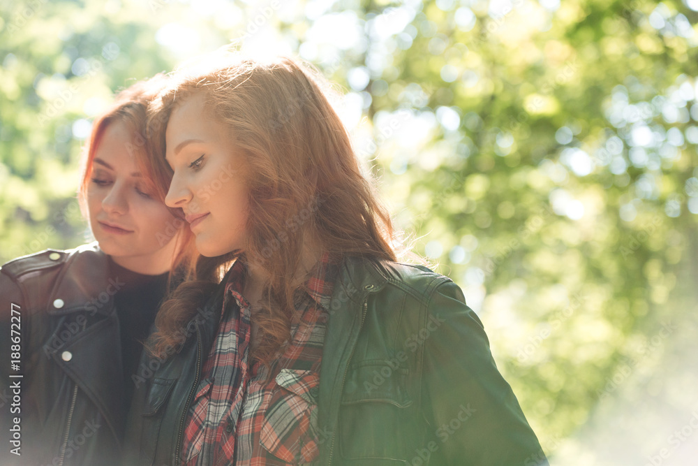 Red-haired sisters in the forest Red-haired sisters in the forest
