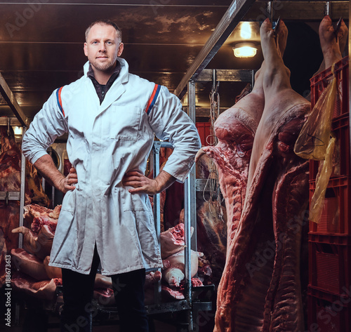 The butcher in a meat factory.