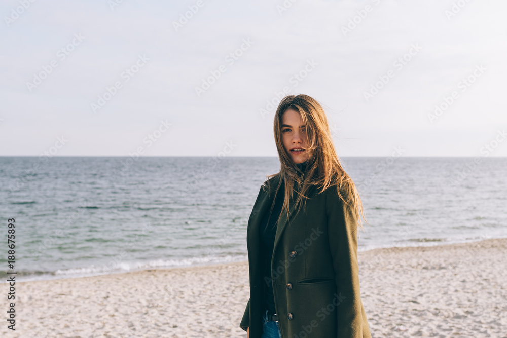 Beautiful young woman in a green coat Beautiful young woman in a green coat