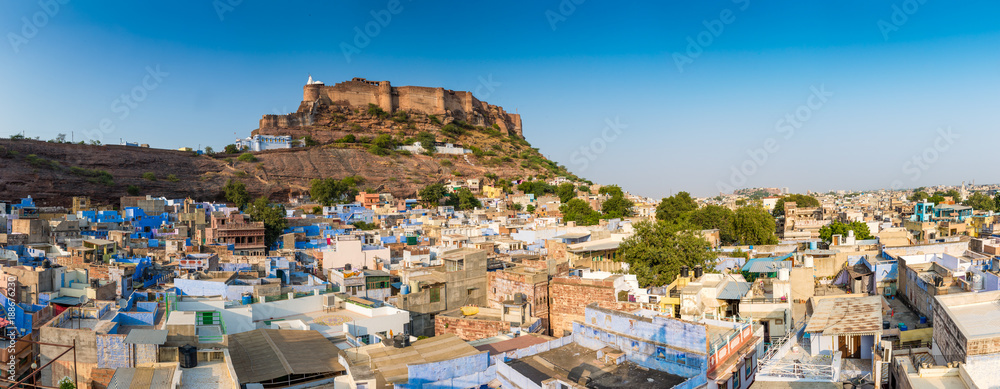 Panoramic rooftop view over the blue city of Jodhpur and Fort Mehrangarh, Rajasthan