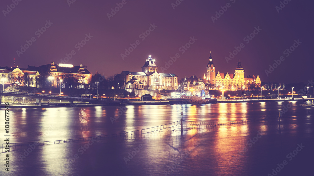Szczecin (Stettin) City at night, vintage toned picture, Poland.