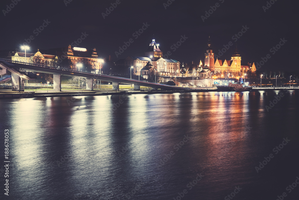Szczecin (Stettin) City skyline at night, vintage toned picture, Poland.