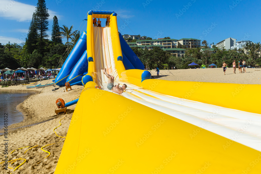 Fototapeta premium Beach Holidays ManThrill High Water Slide
