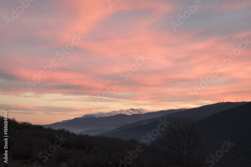 Dramatic Mountain sunset in orange colors. Greece, Seli © silalena