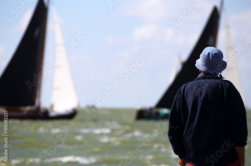 Traditional Frisian wooden sailing ships in a yearly competition on the Ijsselmeer, The Netherlands