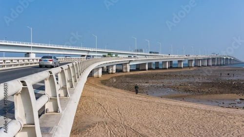 Car Driving On Jimei Bridge, Seaside, Xiamen, China photo