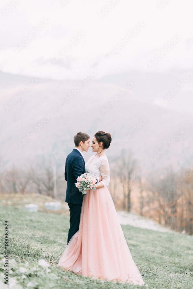 modern wedding in the mountains in Sochi and the sea, a wedding in a European style by car.