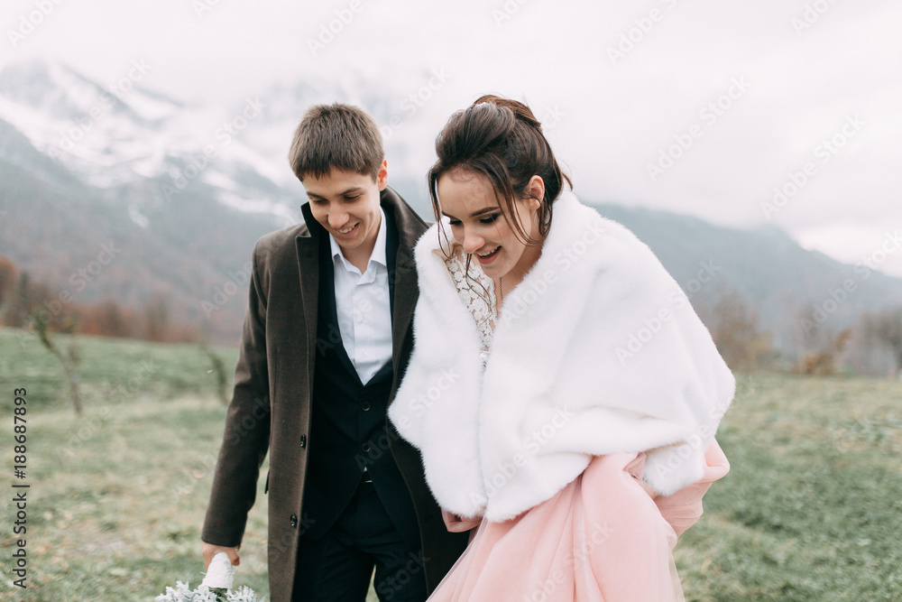 modern wedding in the mountains in Sochi and the sea, a wedding in a European style by car.