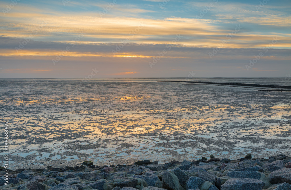 Evening mood over the Wadden Sea - North Sea at Büsum, Germany Evening mood over the Wadden Sea - North Sea at Büsum, Germany