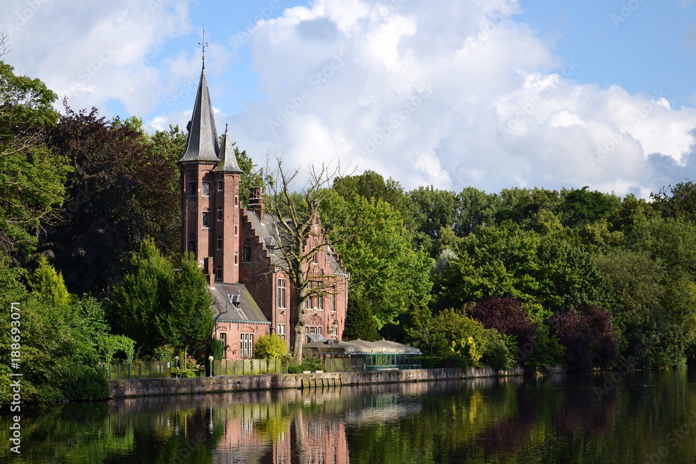 Minnewater Lake of love with Kasteel Minnewater in Bruges, Belgium