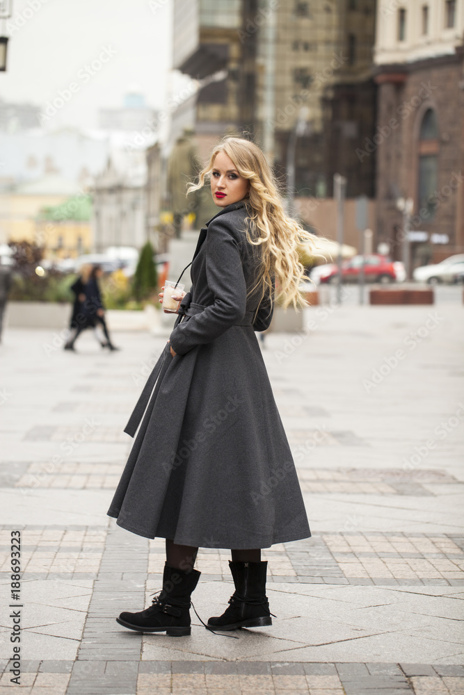Portrait of a young beautiful woman in gray coat Portrait of a young beautiful woman in gray coat