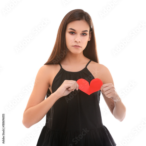 Unhappy woman tearing paper...