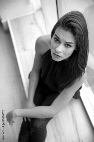 Depressed young woman after...
