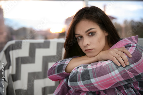 Depressed young woman after...