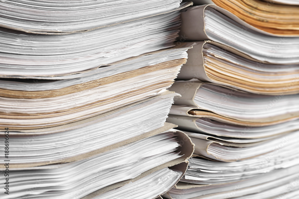 Stacks of old folders with documents in archive, closeup Stacks of old folders with documents in archive, closeup