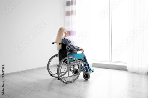 Mature woman in wheelchair ...