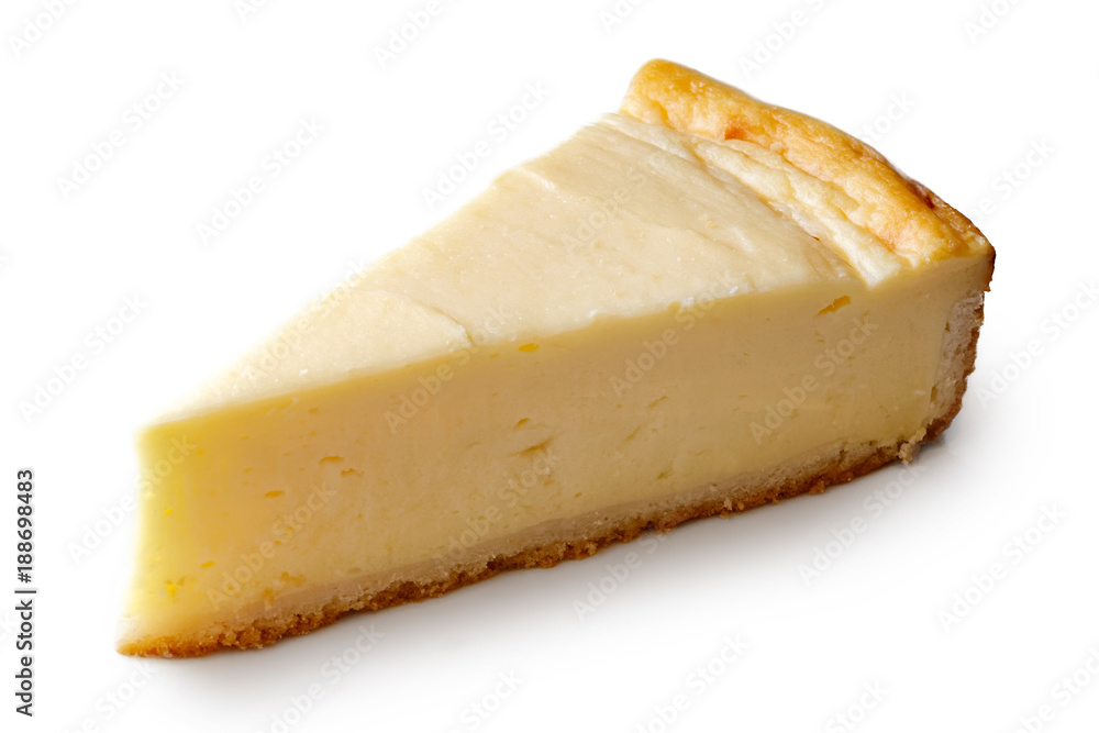 A slice of plain baked cheesecake isolated on white.