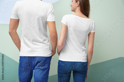 Young woman and man in whit...