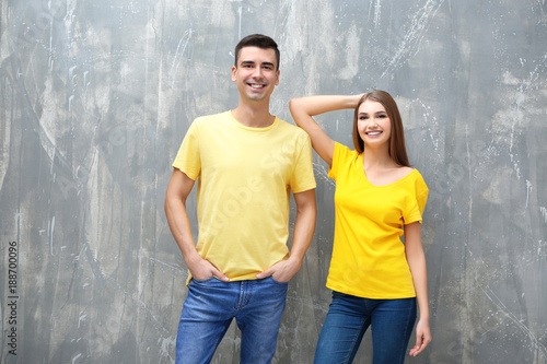 Young woman and man in yell...