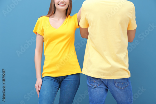 Young woman and man in yell...