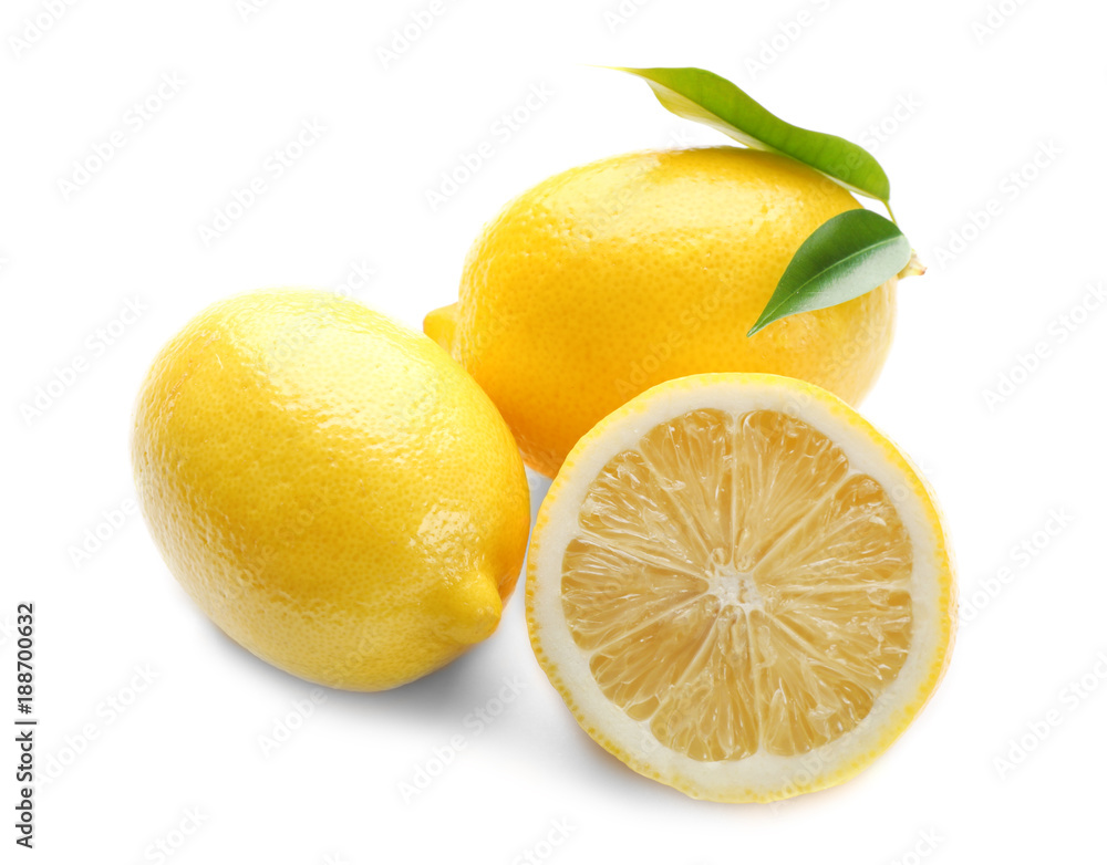 Fresh ripe lemons with leaves on white background