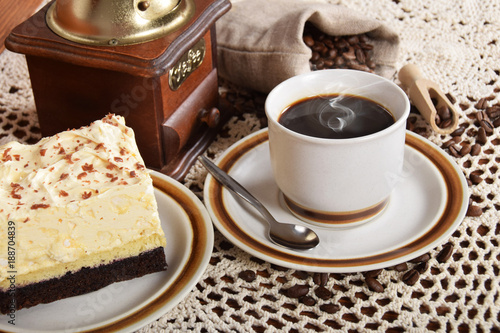 black coffee in a cup with chocolate cake