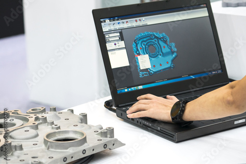 Obraz na plátne engineer working on computer at the design of mechanical piece