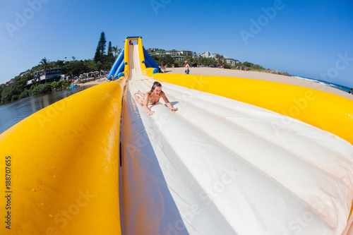 Girl Excitement High Water Slide Beach