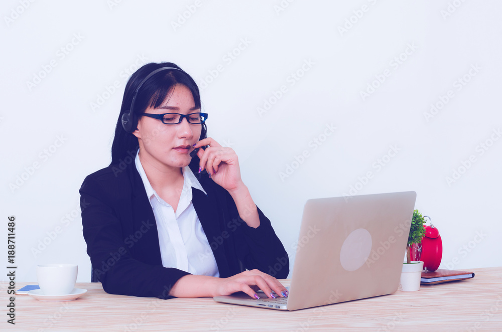 confident business woman working on tablet to with headphone. call center working concept. confident business woman working on tablet to with headphone. call center working concept.