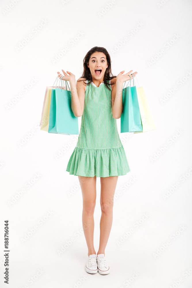 Full length portrait of a happy girl in dress Full length portrait of a happy girl in dress