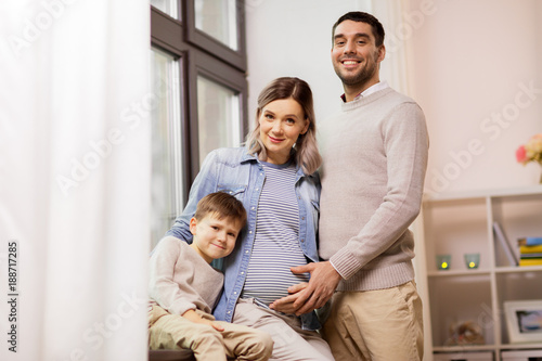 happy family with pregnant mother at home © Syda Productions