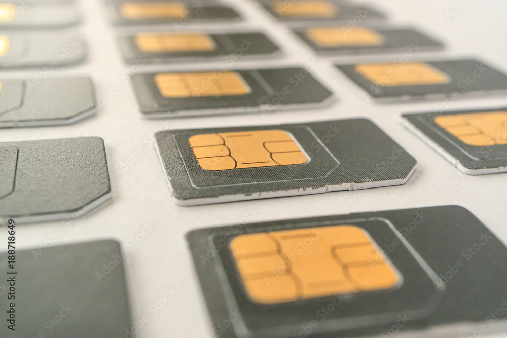 lying in three rows SIM cards for cell phones lying in three rows SIM cards for cell phones