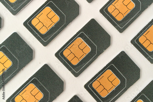 Принти на полотні SIM card lying at an angle, a lot of SIM cards for cell phones