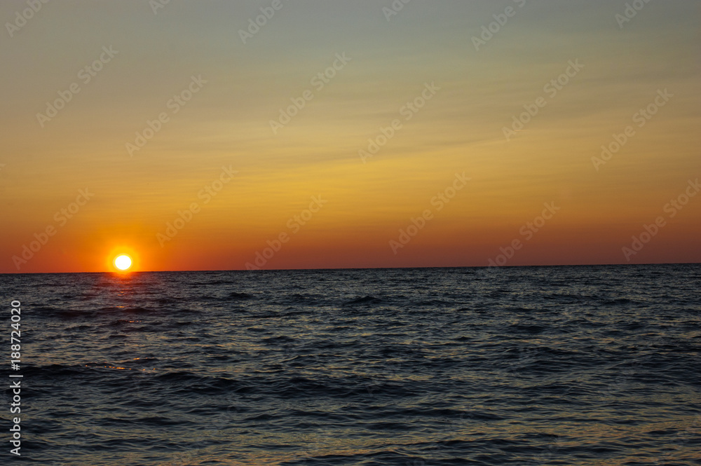 sea. sunset, the sun going into the sea