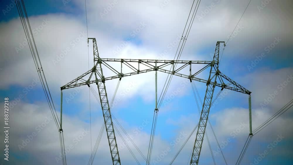 Power line support against the background of the blue sky with clouds Power line support against the background of the blue sky with clouds