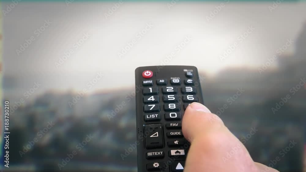 Changing Channels TV Television Lost Signal. Male hand using a remote