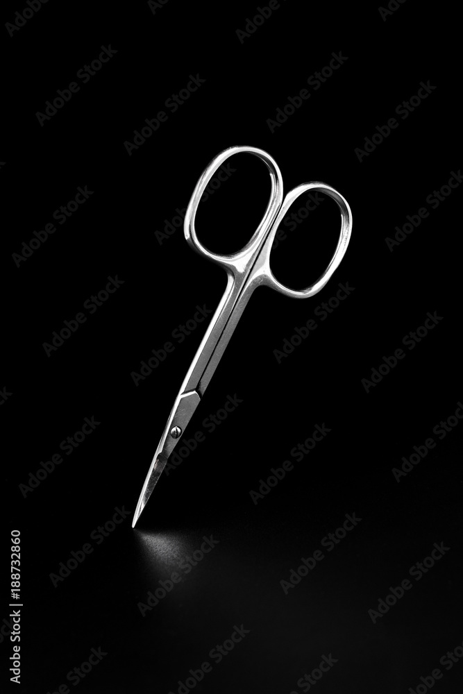 metal manicure scissors isolated on black metal manicure scissors isolated on black