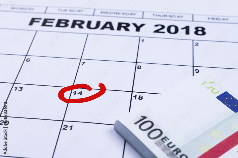February 14 marked on the calendar and the money set aside for gifts. February 14 marked on the calendar and the money set aside for gifts.